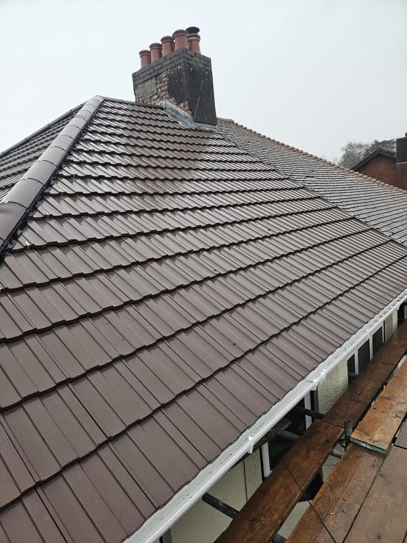 New slate roof installation on UK house